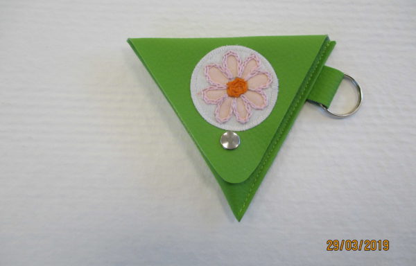 Llavero con bolsillo